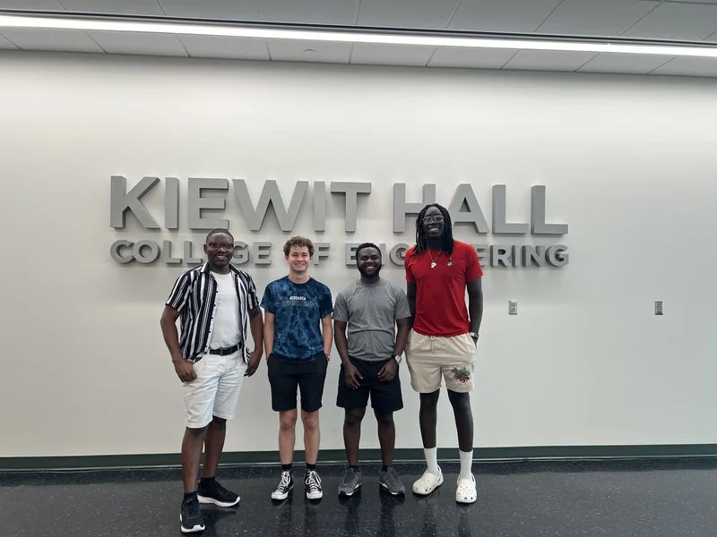 Abraham Osinuga with research mentees at Kiewit Hall, University of Nebraska–Lincoln, in summer 2024